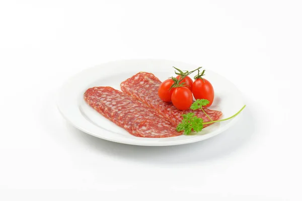 Cienkie plasterki salami — Zdjęcie stockowe