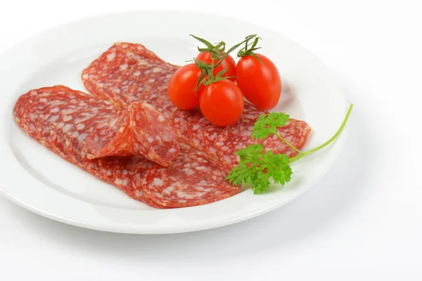 Cienkie plasterki salami — Zdjęcie stockowe