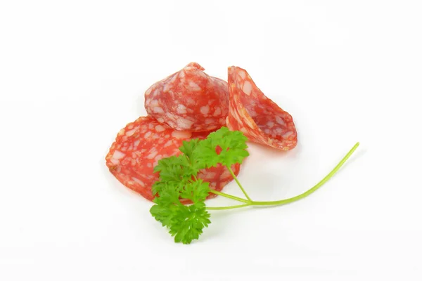 Thin slices of salami — Stock Photo, Image