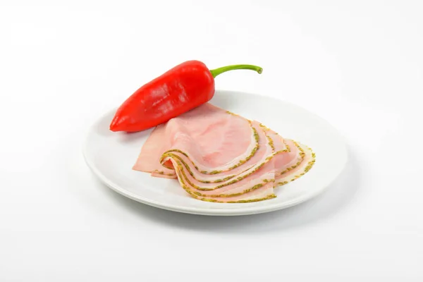 Asparagus coated ham and pepper — Stock Photo, Image