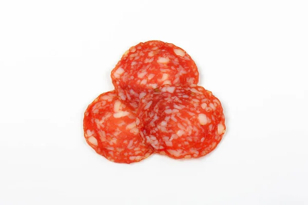 Thin slices of salami — Stock Photo, Image