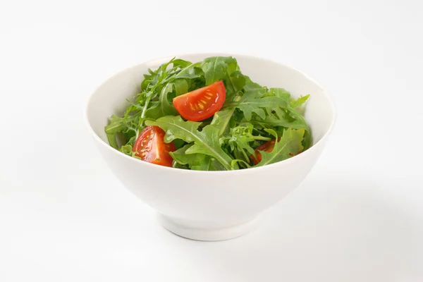 Arugula and tomato salad — Stock Photo, Image