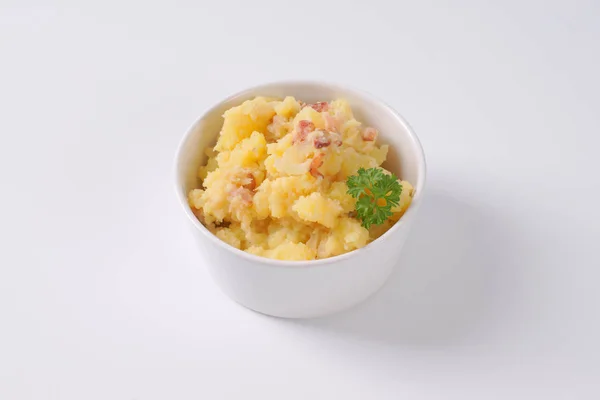 Crushed potatoes with bacon — Stock Photo, Image