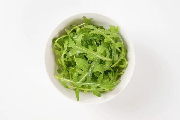 Bowl of fresh arugula — Stock Photo, Image