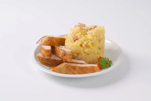 Mashed potatoes with roasted pork — Stock Photo, Image