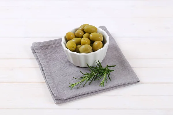 Green olives with rosemary — Stock Photo, Image