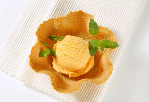 Orange sherbet in a waffle basket — Stock Photo, Image