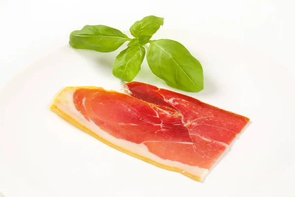 Slice of dry cured ham — Stock Photo, Image