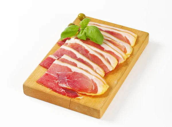 Sliced prosciutto crudo — Stock Photo, Image