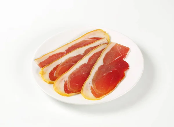 Prosciutto crudo slices — Stock Photo, Image