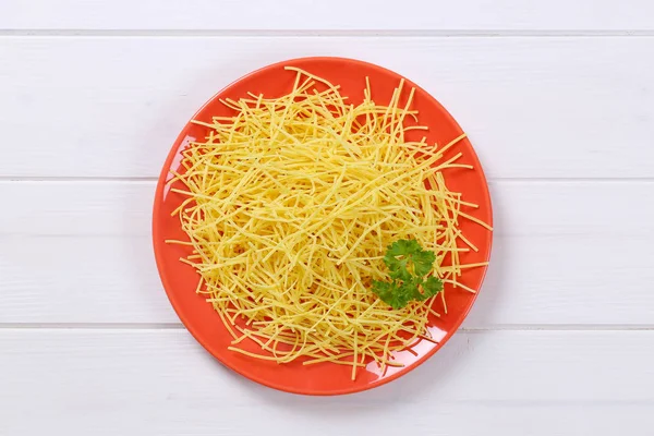 Plate of soup noodles — Stock Photo, Image