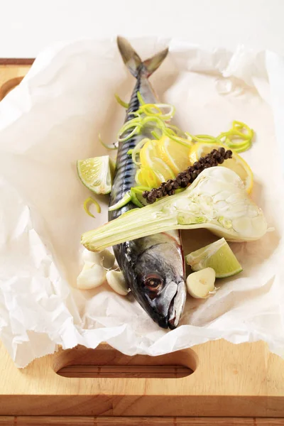 Fresh mackerel on paper — Stock Photo, Image