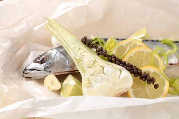 Fresh mackerel on paper — Stock Photo, Image