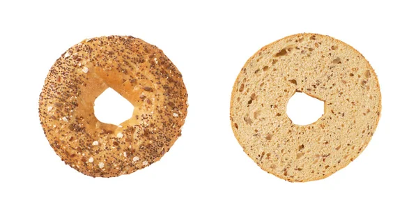 Bagel coupé en deux avec des graines — Photo