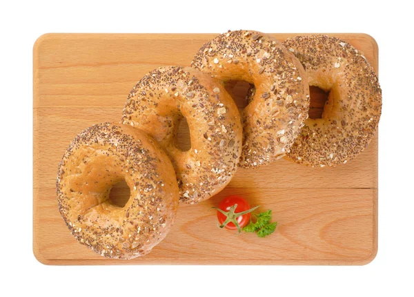 Fresh bagels with seeds — Stock Photo, Image