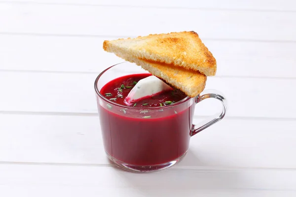 Beetroot cream soup with toast — Stock Photo, Image