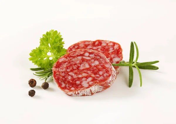Dry cured sausage slices — Stock Photo, Image