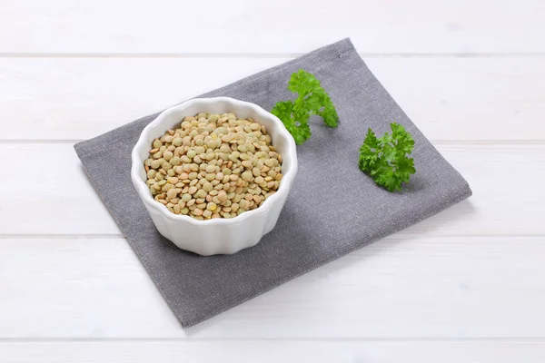 Dry brown lentils — Stock Photo, Image