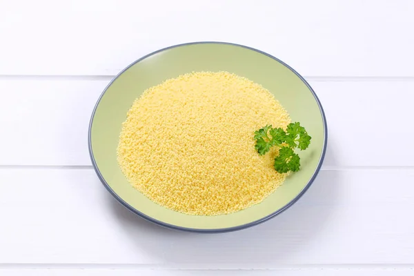 Plate of raw couscous — Stock Photo, Image