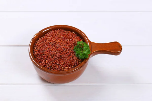 Hrnce červené rýže — Stock fotografie