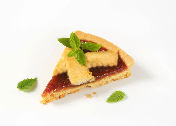 Slice of strawberry jam tart — Stock Photo, Image