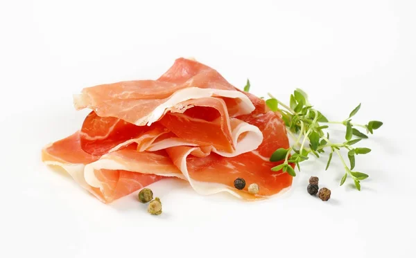 Air dried ham with thyme and pepper — Stock Photo, Image