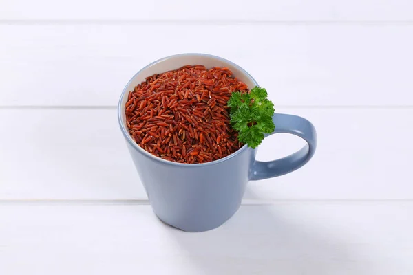 Xícara de arroz vermelho — Fotografia de Stock