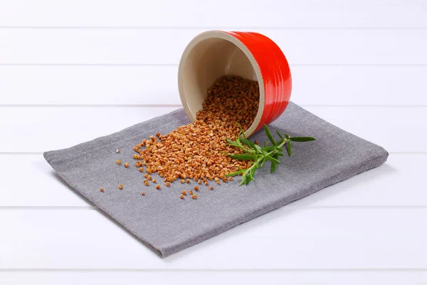 Bowl of raw buckwheat — Stock Photo, Image