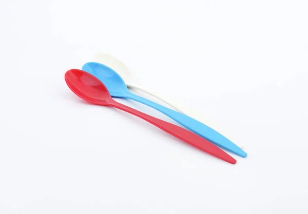 Three long plastic spoons — Stock Photo, Image