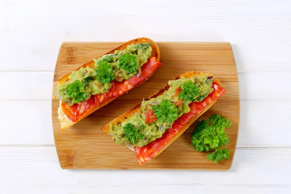 Baguettes with salami and guacamole — Stock Photo, Image