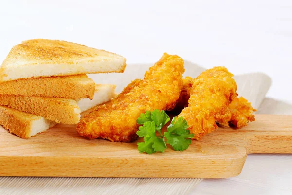 Chicken strips with toast — Stock Photo, Image