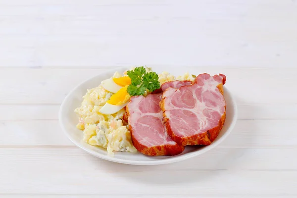 Smoked pork with potato salad — Stock Photo, Image