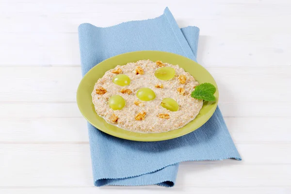 Plate of oatmeal porridge — Stock Photo, Image