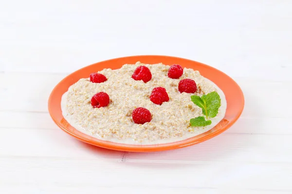 Plate of oatmeal porridge — Stock Photo, Image