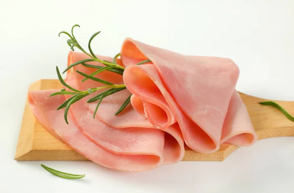 Thin slices of ham and rosemary — Stock Photo, Image