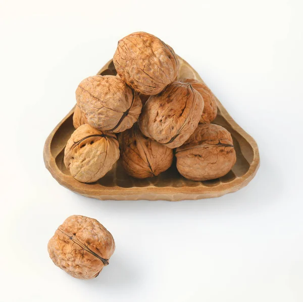 Bowl of whole walnuts — Stock Photo, Image