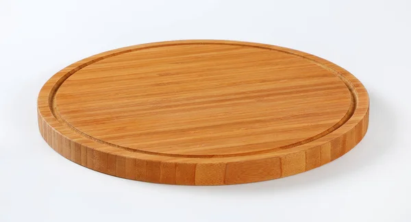Kulatá dřevěná řezací deska — Stock fotografie