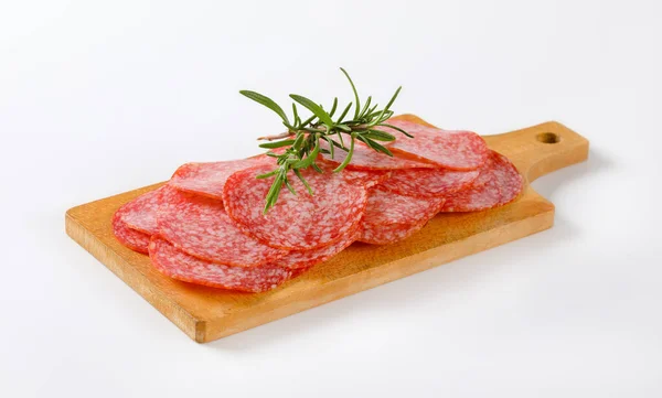 Thinly sliced salami sausage — Stock Photo, Image