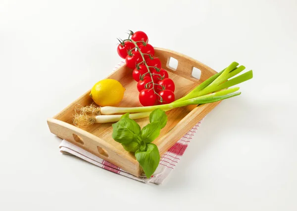 Wooden serving tray wit fresh vegetables and fruit — 스톡 사진