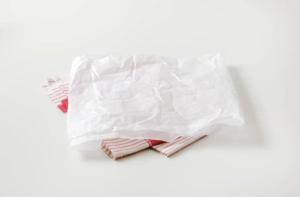 White butcher paper and dish towel — Stock Photo, Image