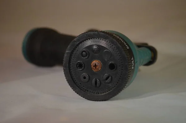 A garden hose nozzle