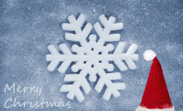 Copo de nieve, sombrero de Navidad, tela de fibra y película de brillo, fondo — Foto de Stock