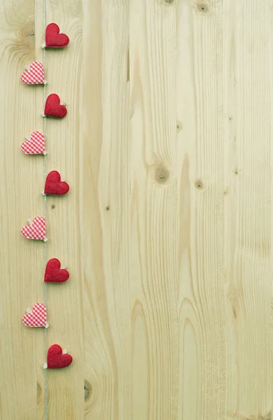 Nove corações em madeira — Fotografia de Stock