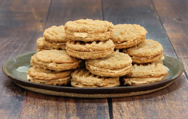 Peanut Butter and Oatmeal cookies filled with peanut butter crea — Stock Photo, Image