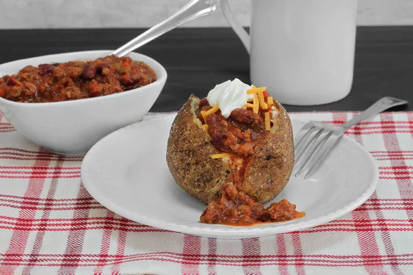 One Baked Potato Topped Chili Cheddar Cheese Sour Cream Macro — Stock Photo, Image