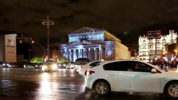 Big (Bolshoy) theatre at night illuminated for international festival  Circle of light on October 13, 2014 in Moscow, Russia — Stock Video