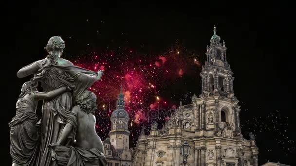 Sculpture on the Bruhl Terrace and  Hofkirche or Cathedral of Holy Trinity and holiday fireworks - baroque church in Dresden, Sachsen, Germany — Stock Video