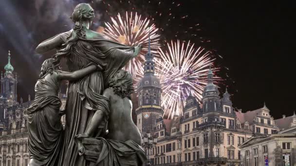 Sculpture on the Bruhl Terrace and  Hofkirche or Cathedral of Holy Trinity and holiday fireworks - baroque church in Dresden, Sachsen, Germany — Stock Video