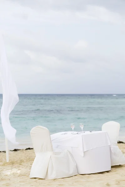 Romantic Table for Two on the Beach Stock Picture
