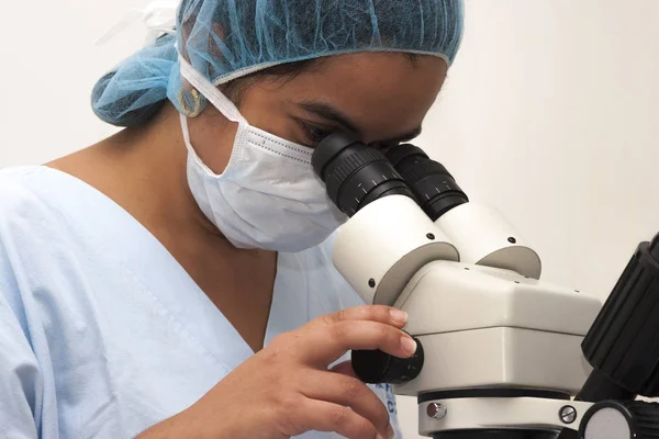 At the microscope — Stock Photo, Image